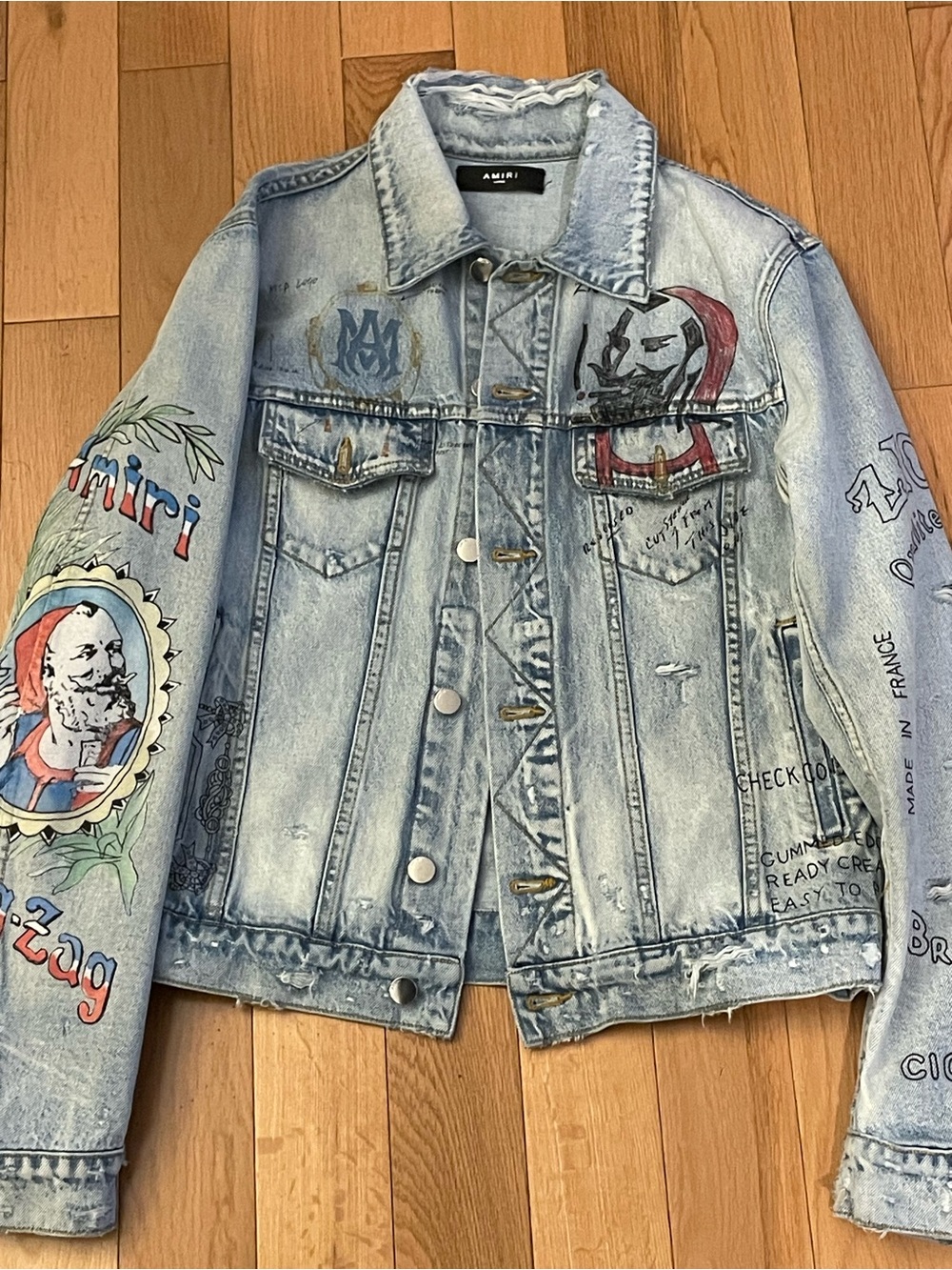 AMIRI Light Blue Denim Jacket with Colorful Graphic Details